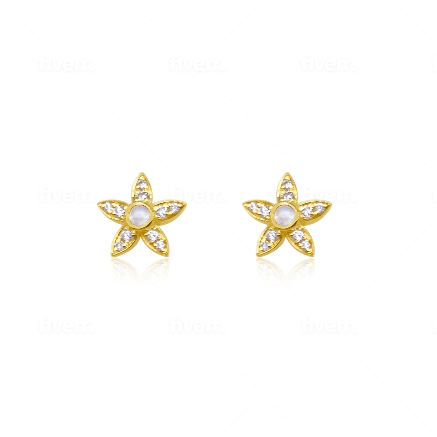 yellow gold and diamond studs with centered moonstone
