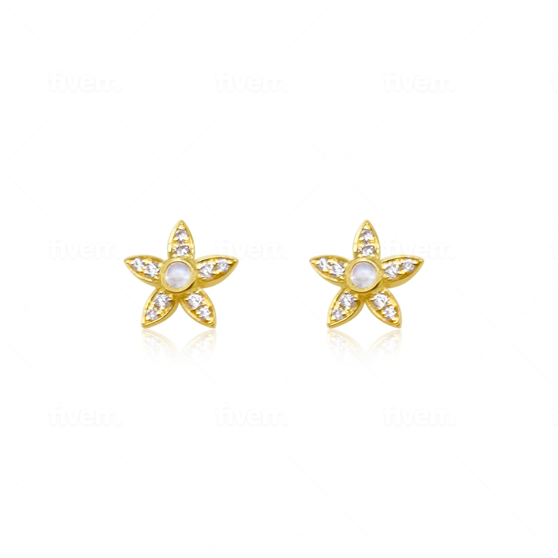 yellow gold and diamond studs with centered moonstone