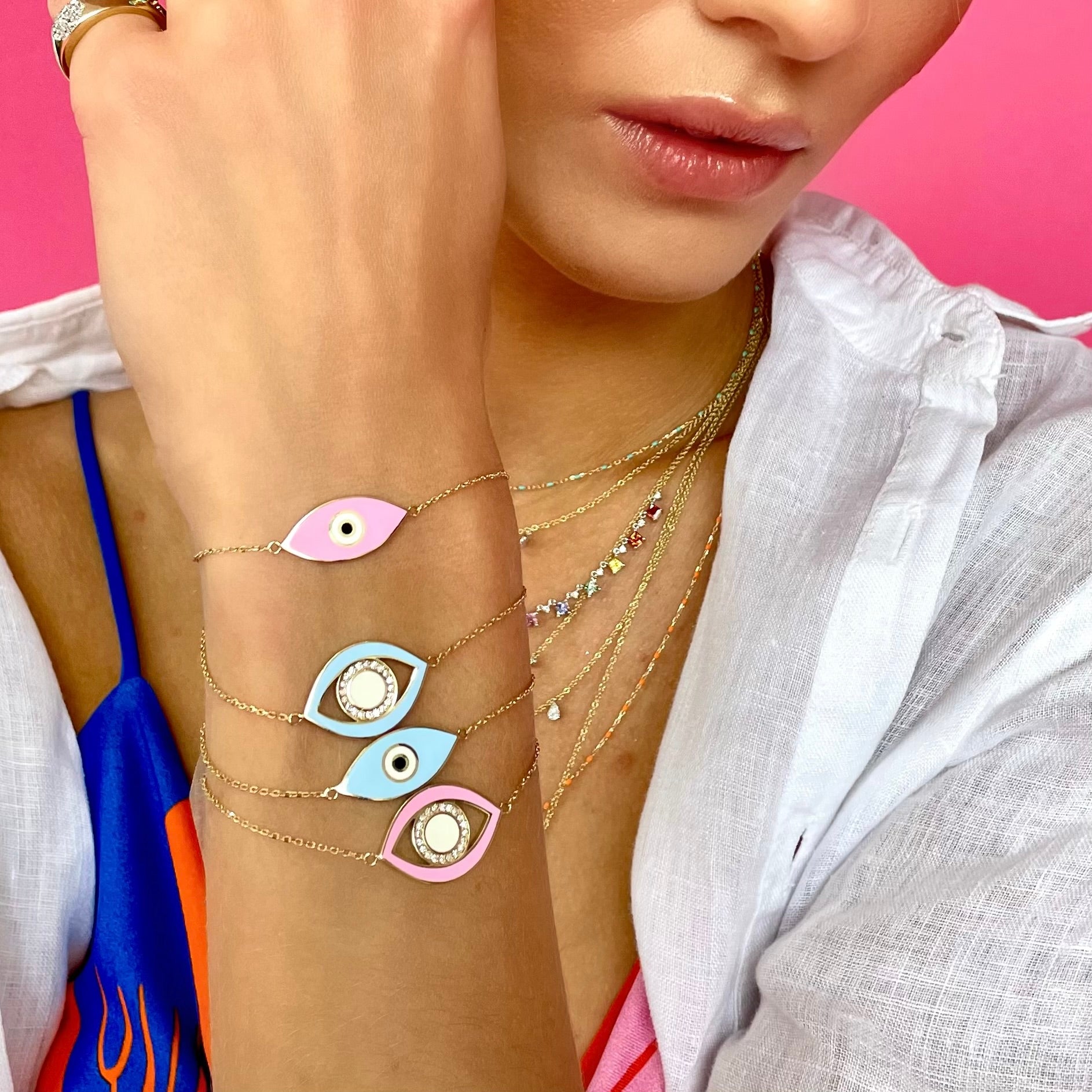 yellow gold and baby pink evil bracelet